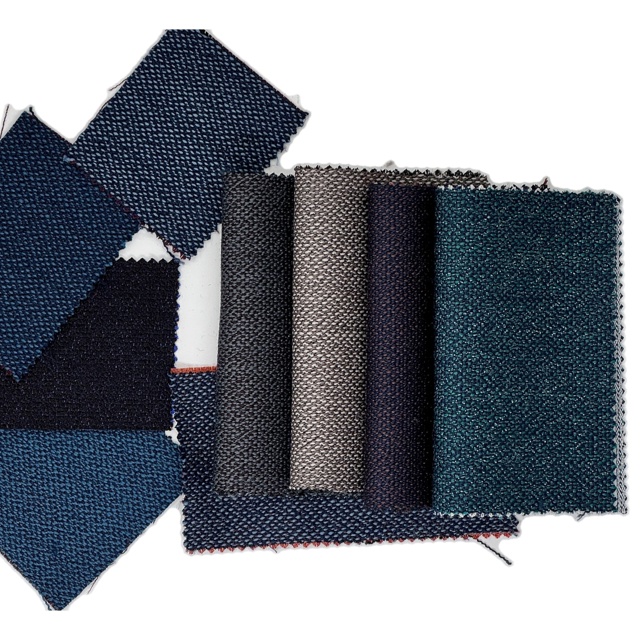 Tre fargevarianter av GUs togstoff, skreddersydd for togoperatør